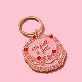 I'm Just a Girl Vintage Cake Enamel Keychain